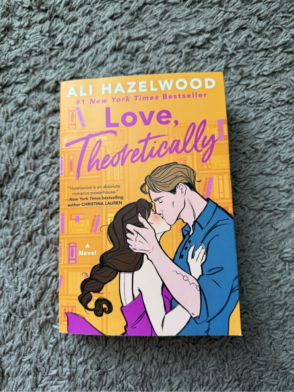 Love, Theoretically by Ali Hazelwood — Bright Yellow & Purple Paperback